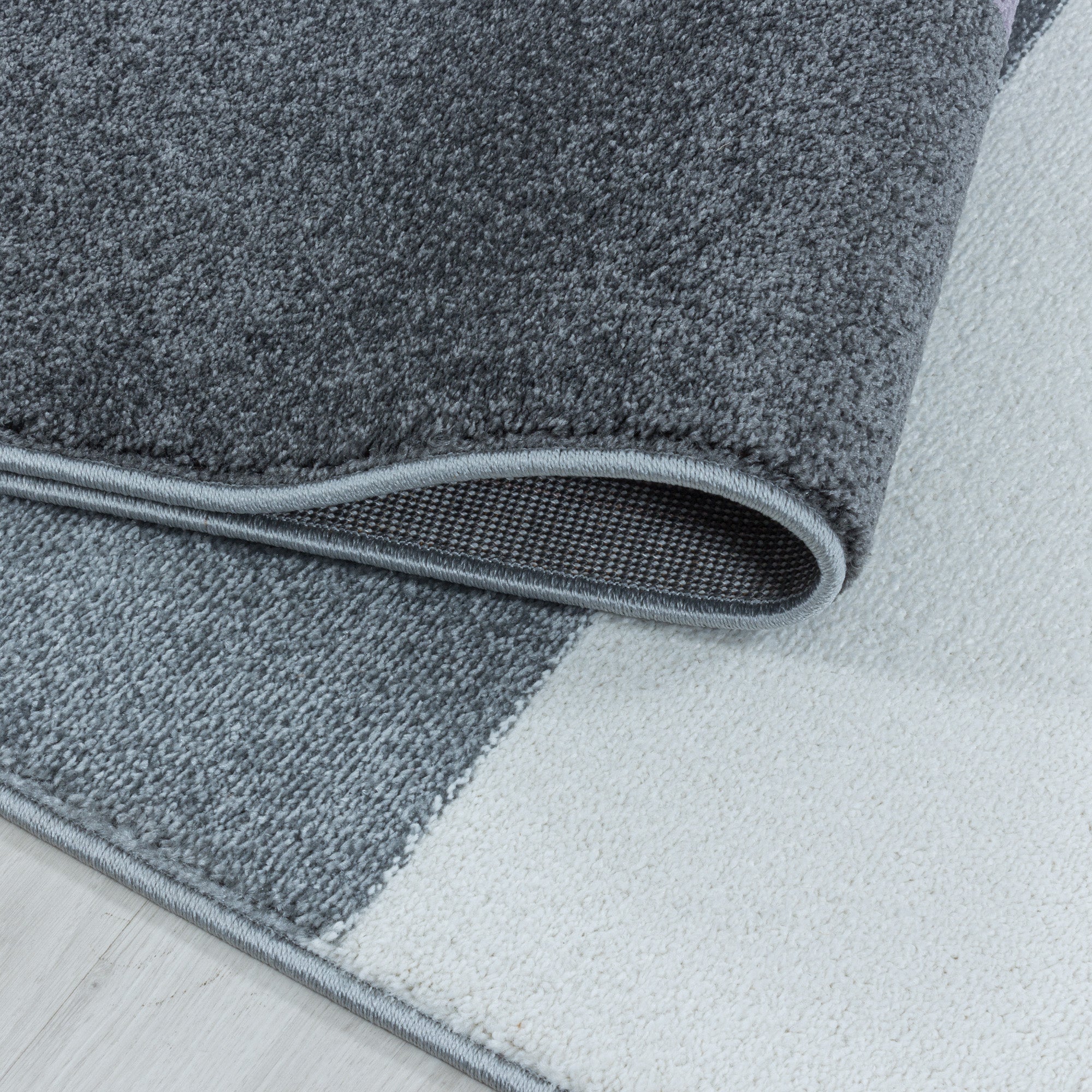 Kurzflor Design Teppich Wohnzimmerteppich Zipcode Muster Abstrakt Violet