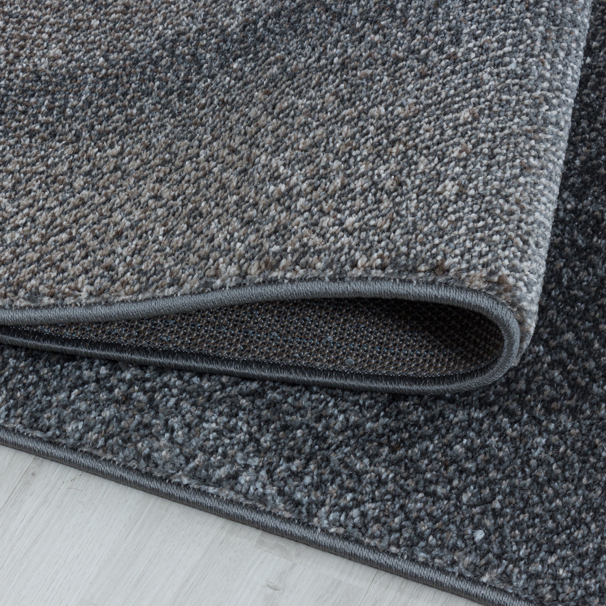 Kurzflor Design Teppich Wohnzimmerteppich Plastische Schatten Muster Braun