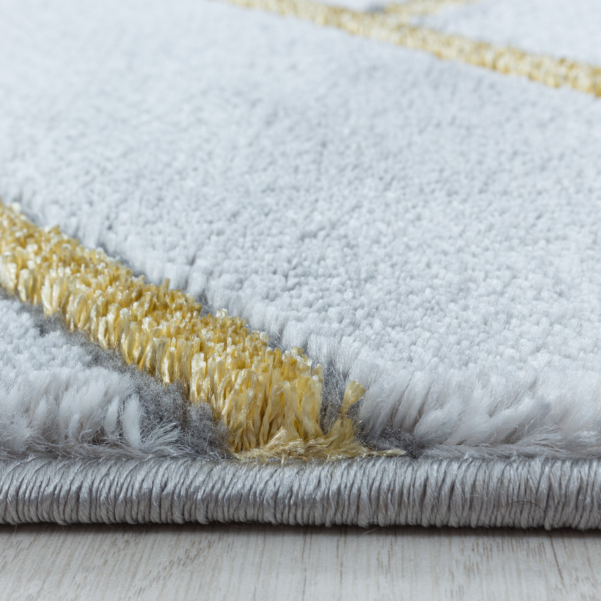 Kurzflor Design Teppich Wohnzimmerteppich Muster Marmoriert Linien Karo Gold