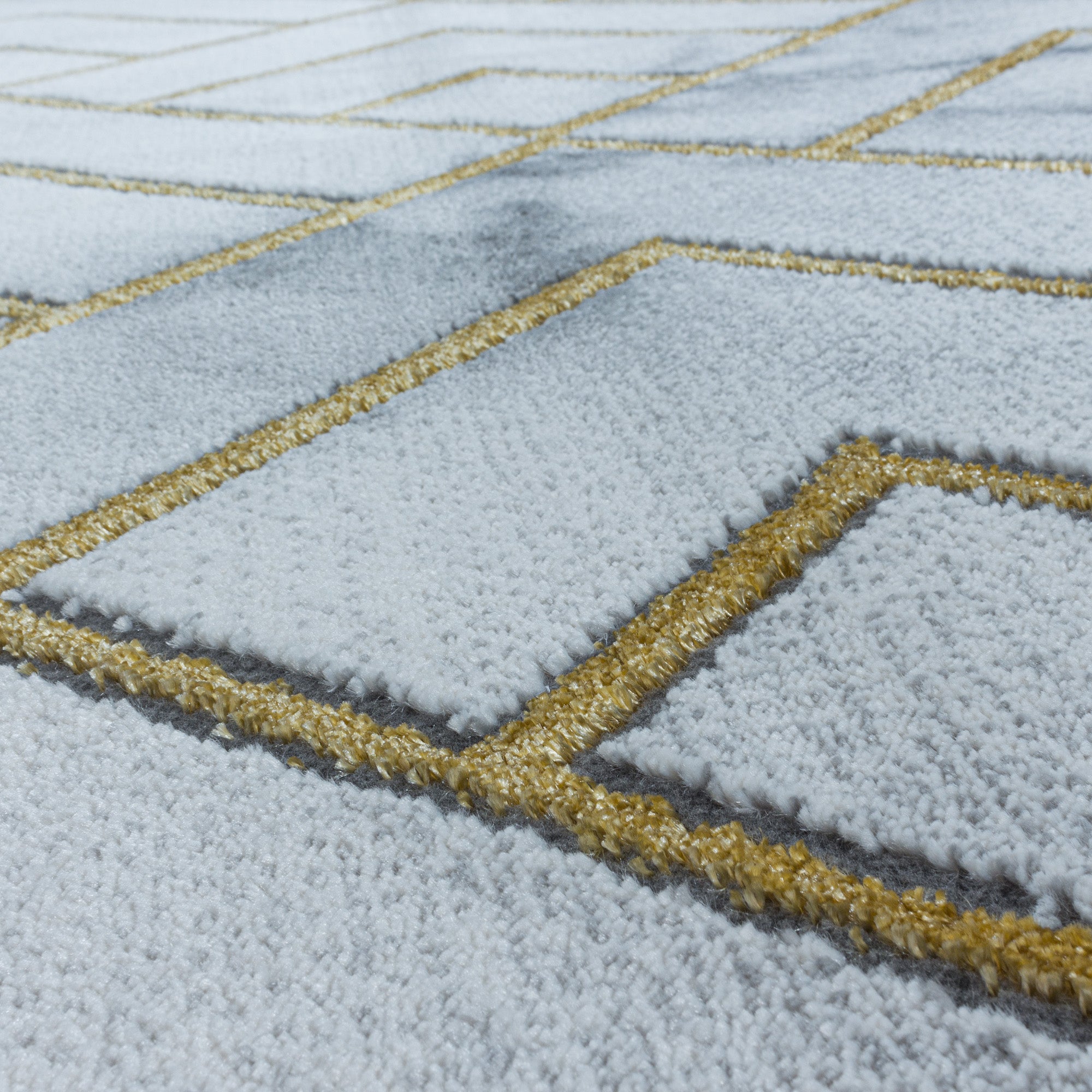 Kurzflor Design Teppich Wohnzimmerteppich Muster Marmoriert Linien Karo Gold