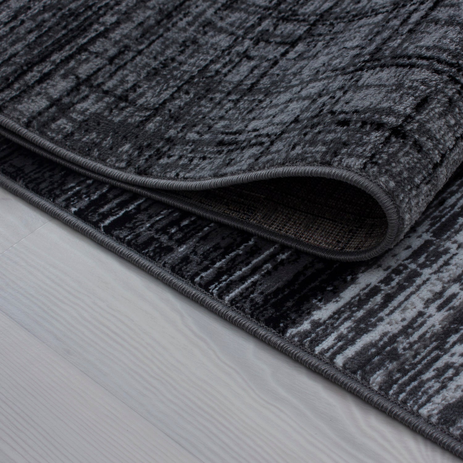 Kurzflor Design Teppich Modern geometrisches Muster Grau Schwarz Weiss Meliert