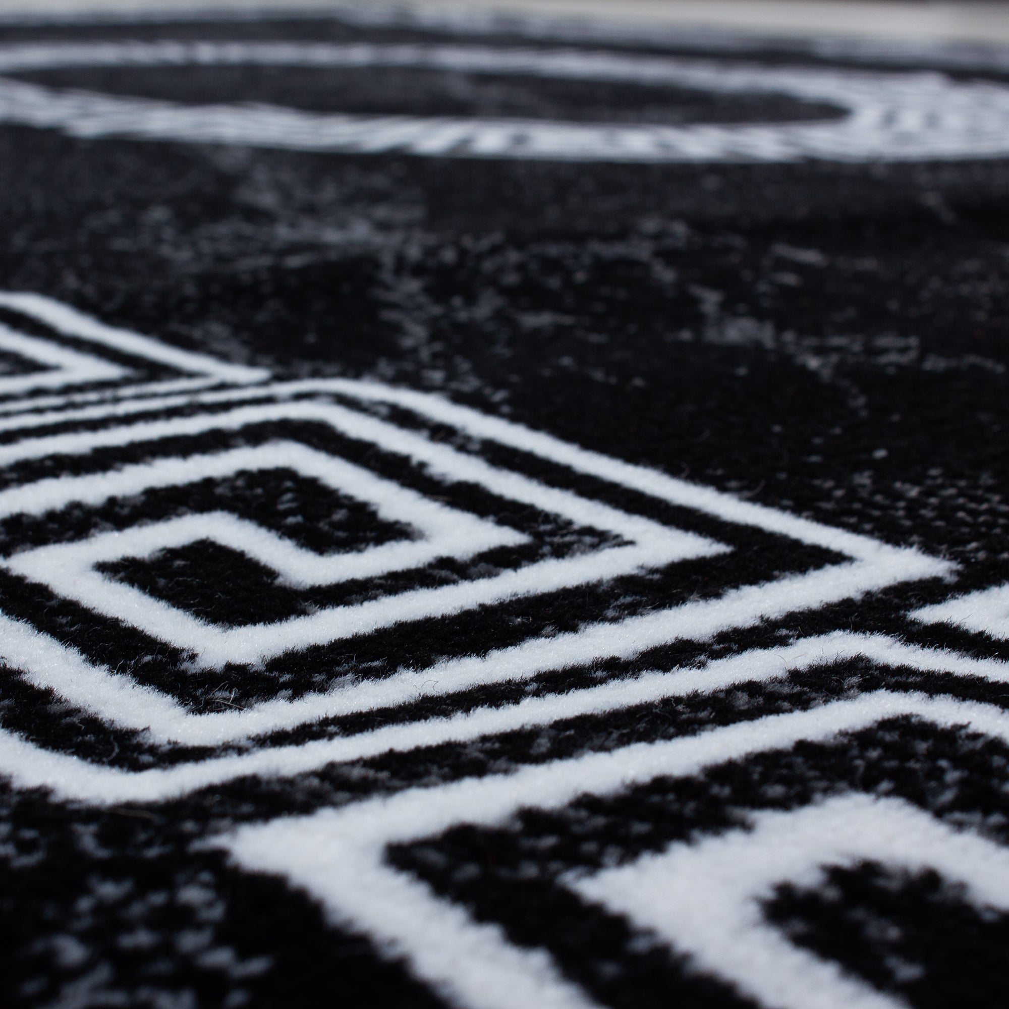 Kurzflor Design Teppich Griechisches Ornament Muster Troja Grau Schwarz Meliert