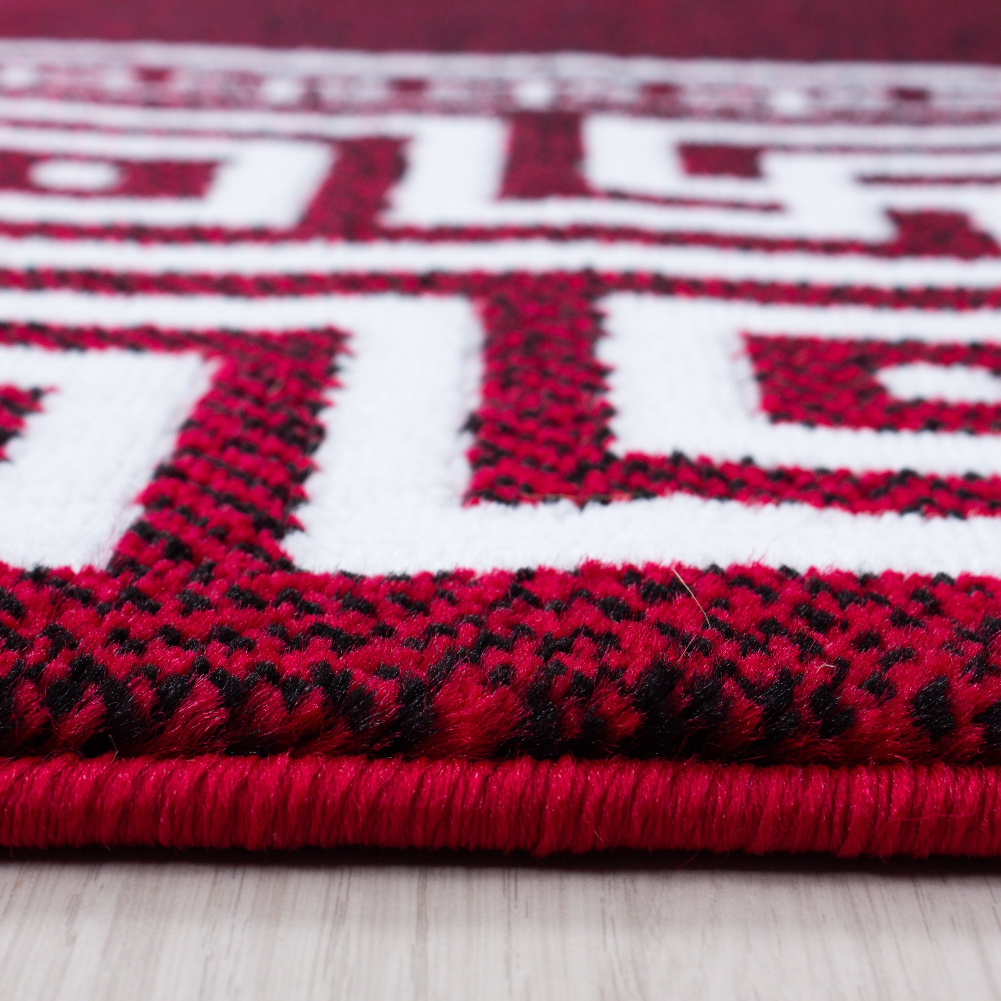 Moderner Kurzflor Teppich Griechiches Muster Bordüre Wohnzimmer Rot Meliert
